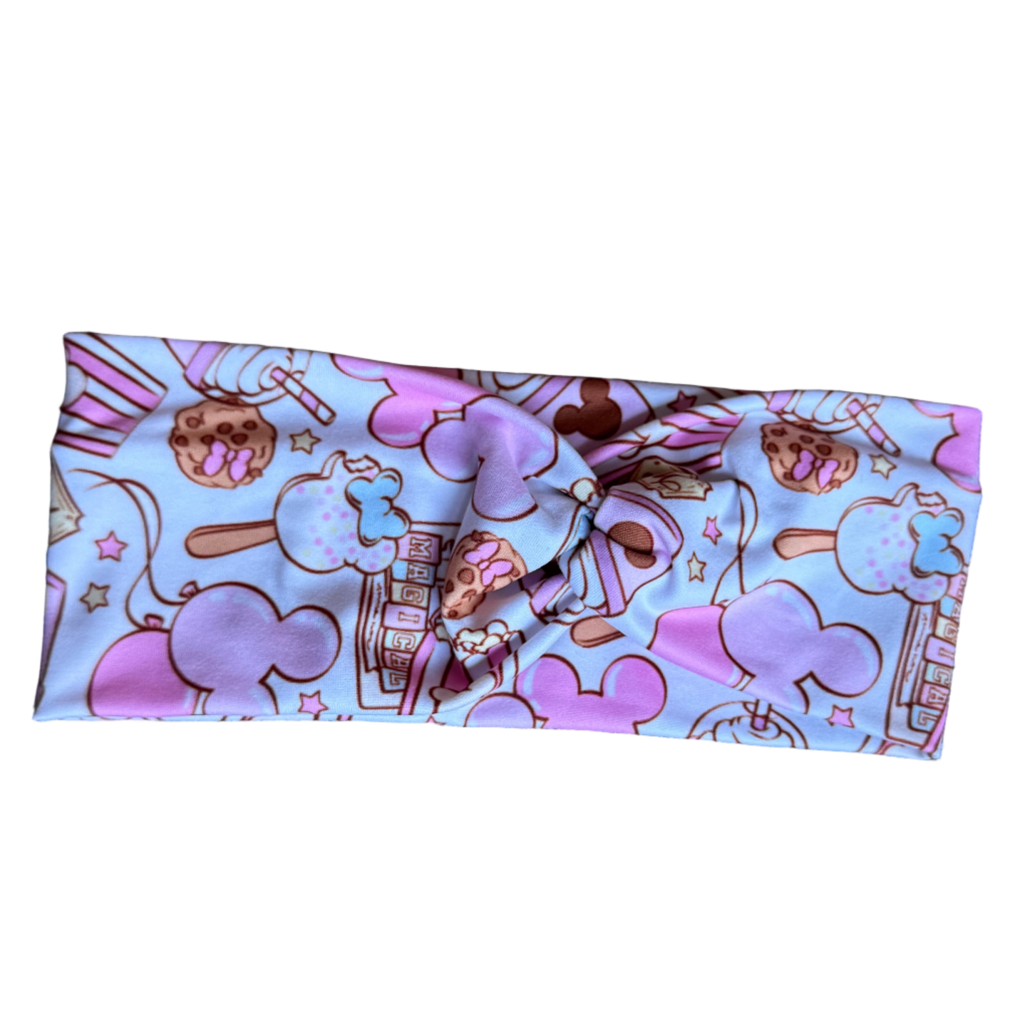 Patterned headband on a gray fabric surface