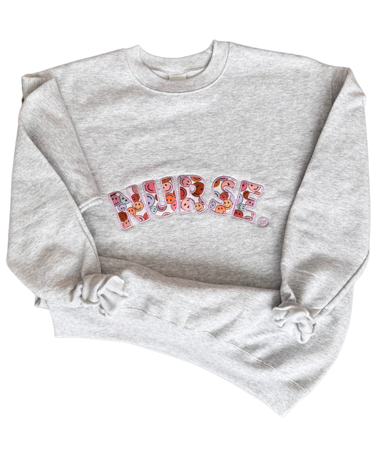 Nurse Embroidered Happy Face Crew Neck Sweatshirt