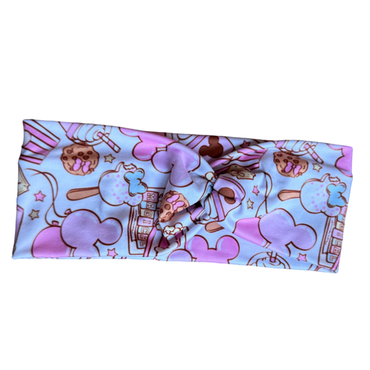 Patterned headband on a gray fabric surface